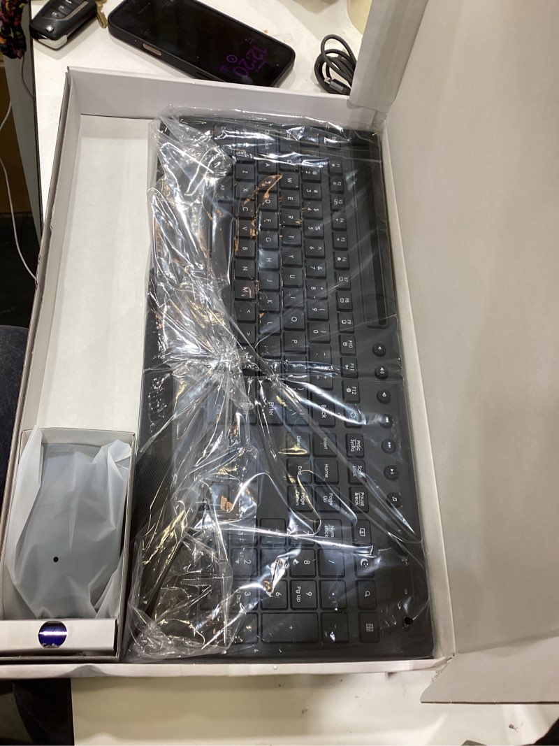 Condition photo showing As Is for Trueque Wireless Keyboard and Mouse Combo - Full-Size Quiet Keyboard with Palm Rest, Phone Holder, Multimedia Keys, Power Switch, Compatible with Windows, Chrome OS, PC, Laptop (Batteries Included) Black
