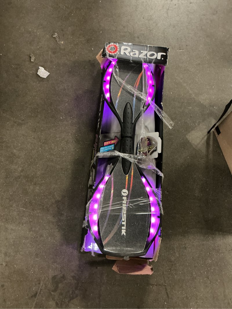 Condition photo showing As Is for razor black label ripstik ripster light-up, caster skateboard with multi-color lights, for child 8+