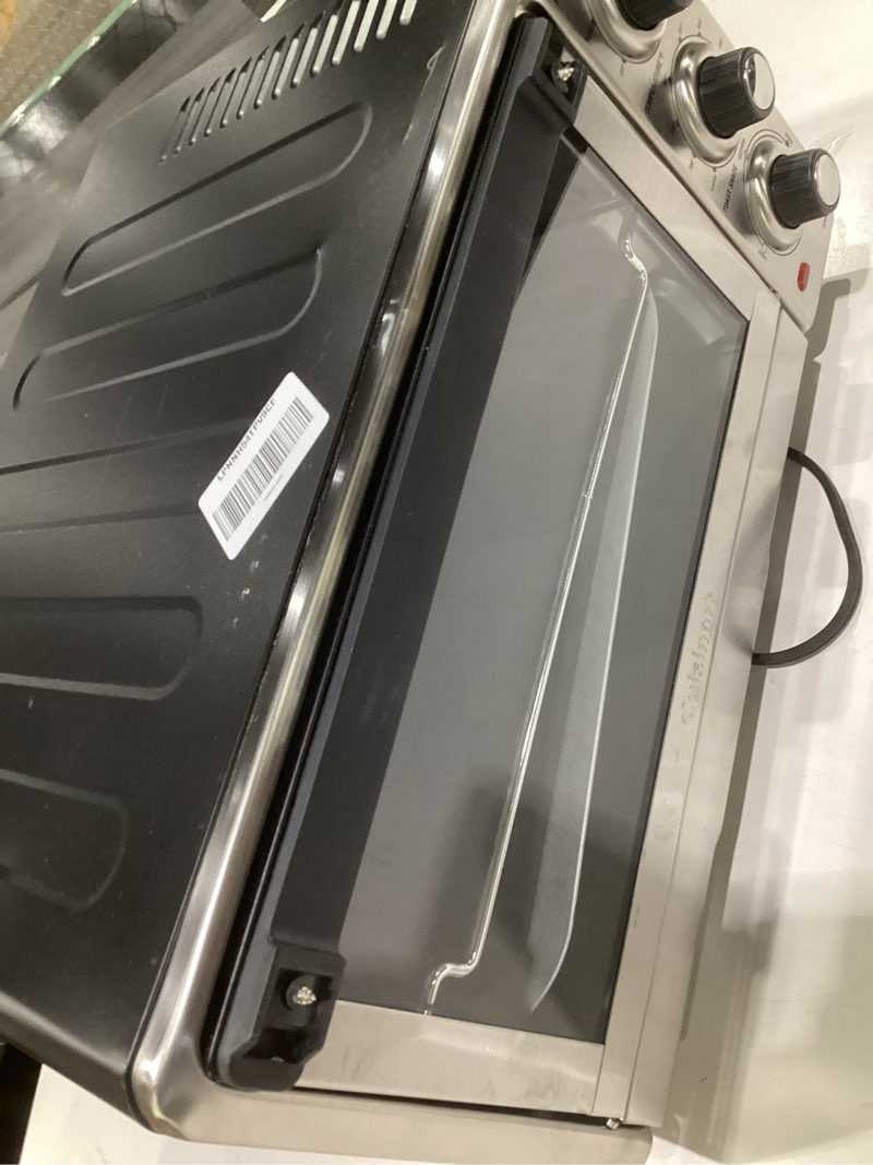 Condition photo showing As Is for (damaged, not handle, not tested)cuisinart custom classic toaster oven broiler, 1800 watt countertop toaster oven to bake, broil, and toast, non-stick interior, consistent toast control, brushed stainless steel/black, tob-40n