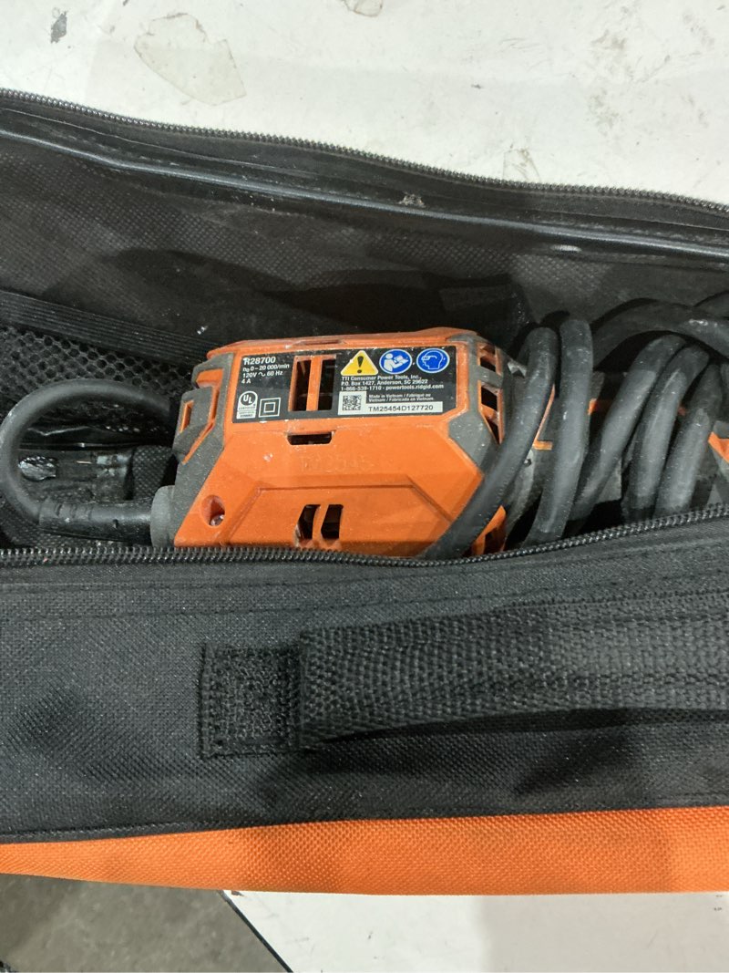 Condition photo showing As Is for 4 amp corded oscillating multi-tool
