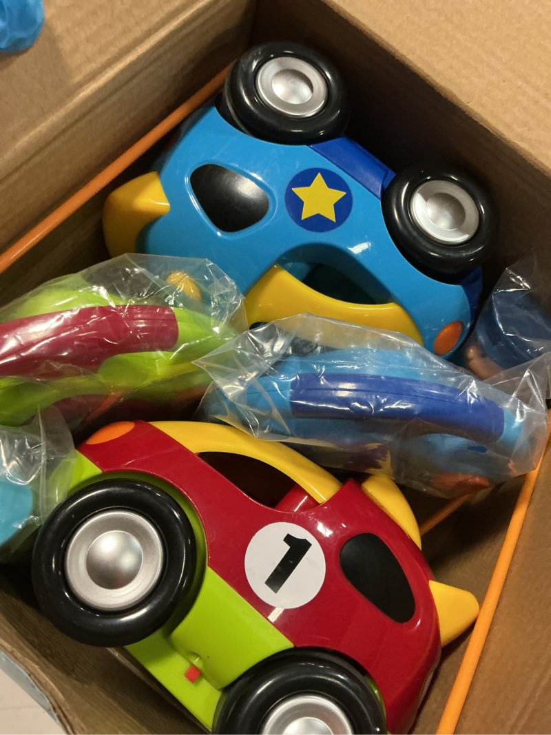 Condition photo showing Good Condition for Prextex 2 Pack Cartoon Remote Control Cars for Toddlers - Police Car and Race Car with Steering Wheel Controllers and Lights - Different Frequencies So Both Can Race Together - Toddler Gift 18+ Months Race Car/Police Car