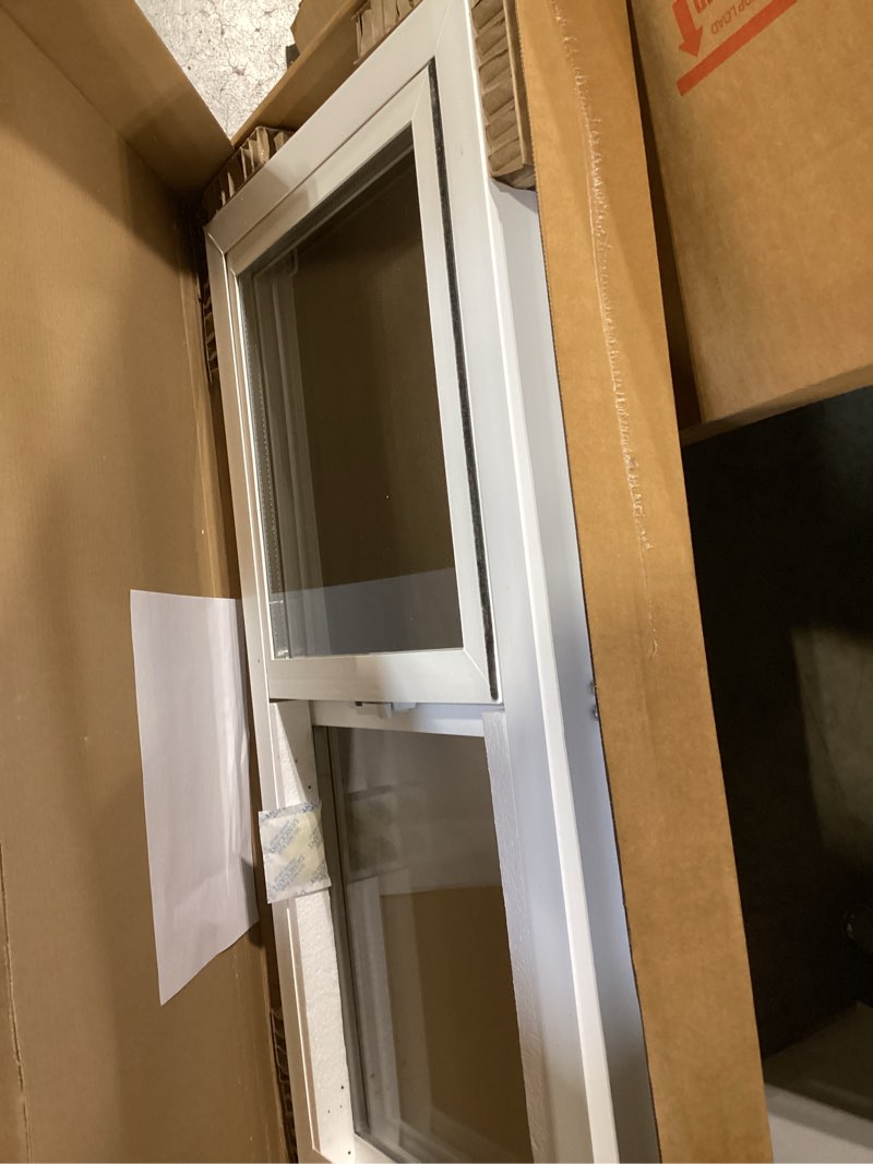 Condition photo showing As Is for left hand sliding vinyl window