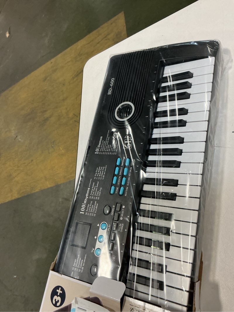 Condition photo showing New/Like New for 61 keys keyboard piano, Electronic Digital Piano with Built-In Speaker Microphone, Sheet Stand and Power Supply, Portable piano Keyboard Gift Teaching for Beginners Black