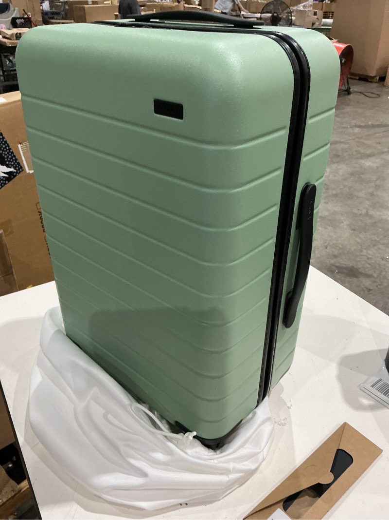 Condition photo showing As Is for away medium checked luggage, 26-inch lightweight hardside spinner suitcase