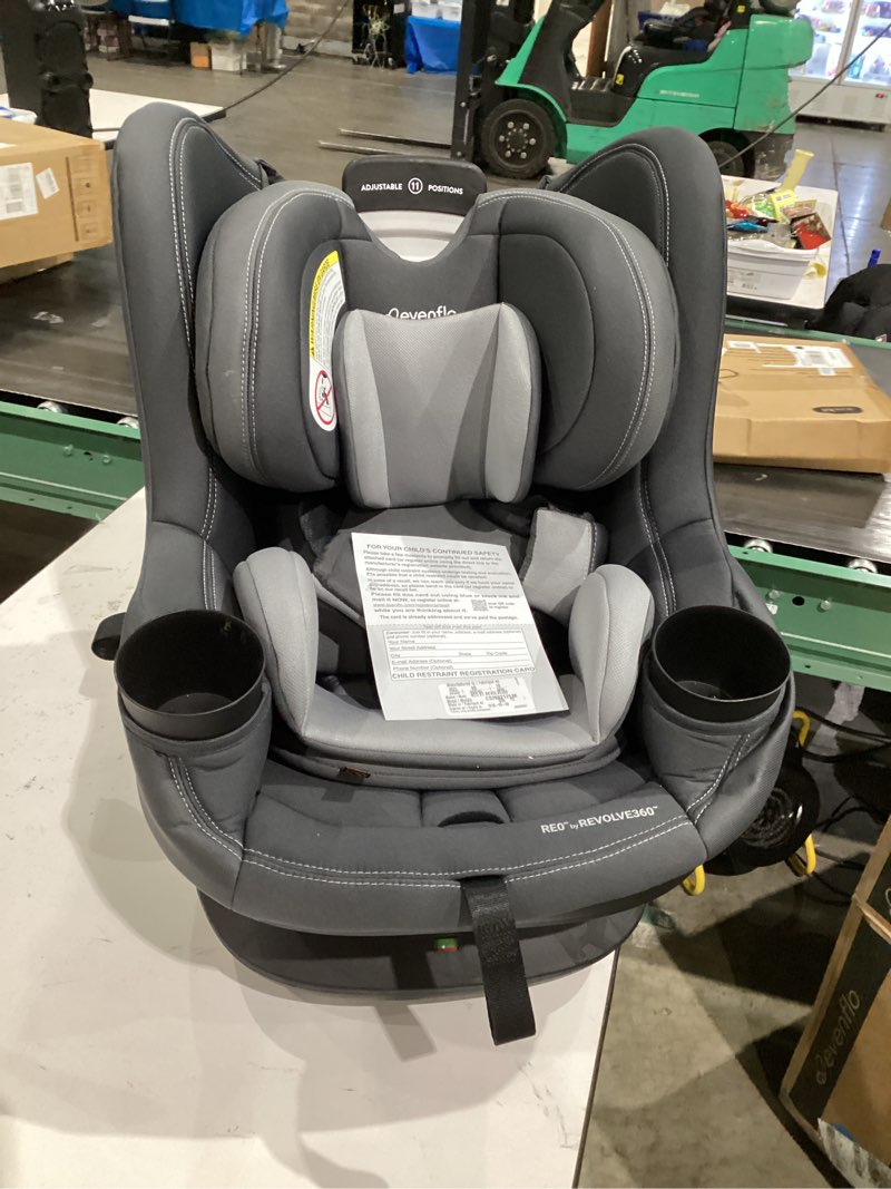 Condition photo showing As Is for Evenflo REO by Revolve360 Rotating Convertible Car Seat with Quick Clean Cover, Infant to Toddler, Forward and Rear Facing, Compact Design, One-time Install (Danvers)