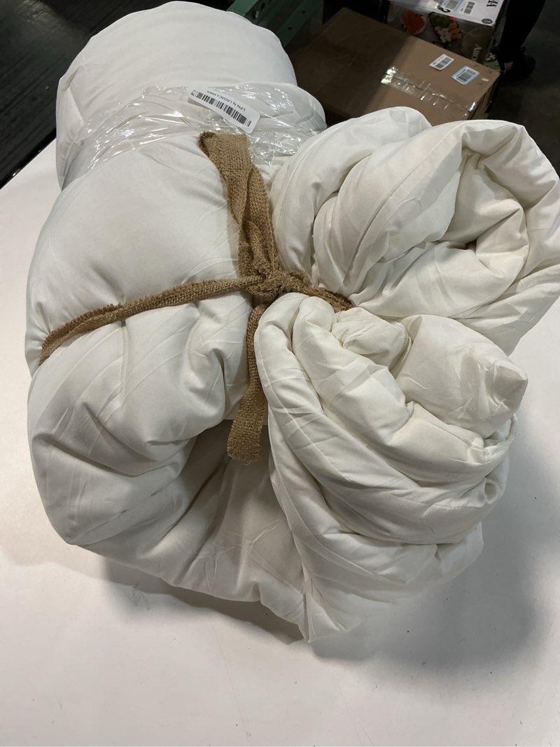 Condition photo showing As Is for ROSGONIA Oversized Queen Comforter Ivory, 3pcs (1 Comforter & 2 Pillowcases) Lightweight Oversized Queen Comforter Sets Bedding Blanket Quilts Oversized Queen Comforter 98"x98" Ivory