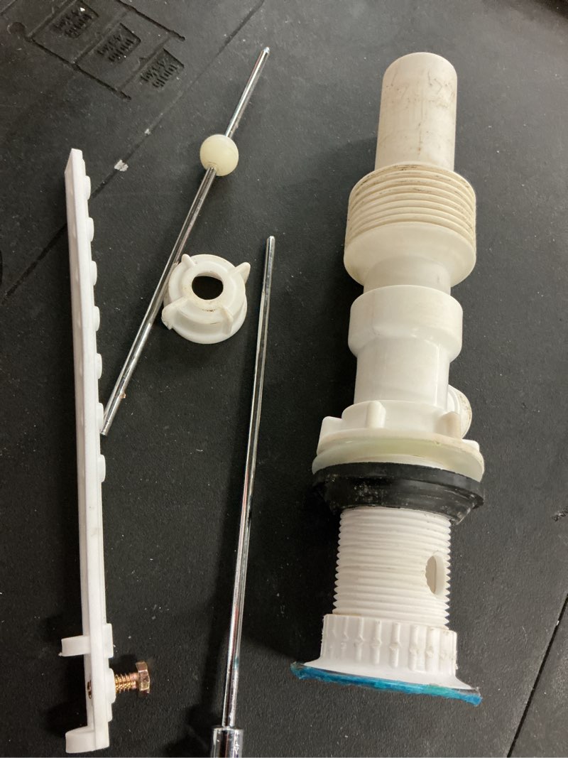 Condition photo showing As Is for form n fit 1-1/4 in. chrome finish plastic sink drain pop-up drain assembly