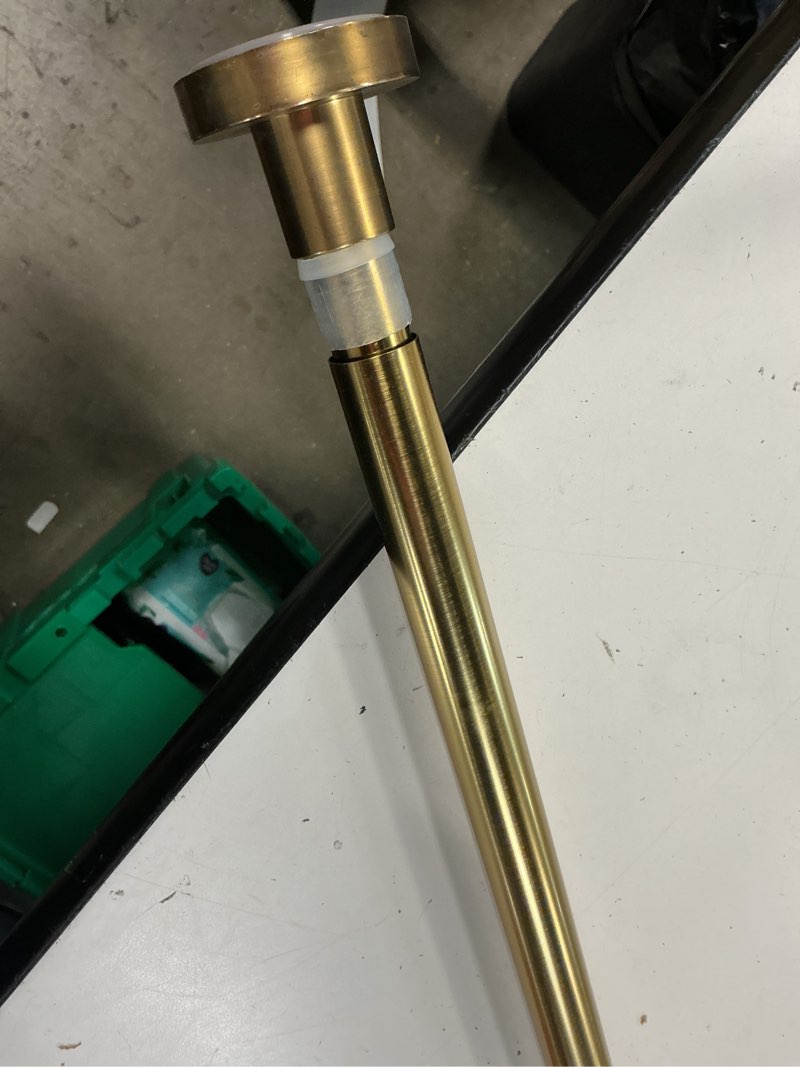 Condition photo showing As Is for shower curtain rod tension- no drill non-slip spring tension shower rod for window or bathroom, 43-73 inches metal steel, gold 43-73 inches gold