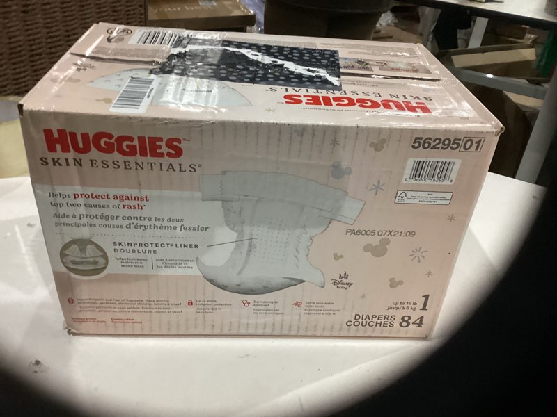 Condition photo showing New/Like New for huggies skin essentials luxury diapers - size 1 - 84ct