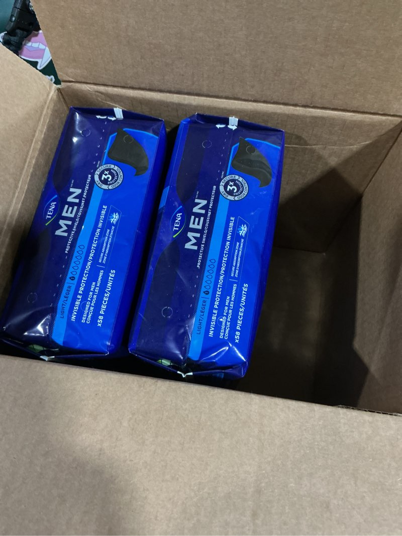 Condition photo showing Good Condition for (Missing 1 pack) Tena Men Light Incontinence Protective Shield for Men, Bladder Control, Discrete, Light Absorbency, 174 Count