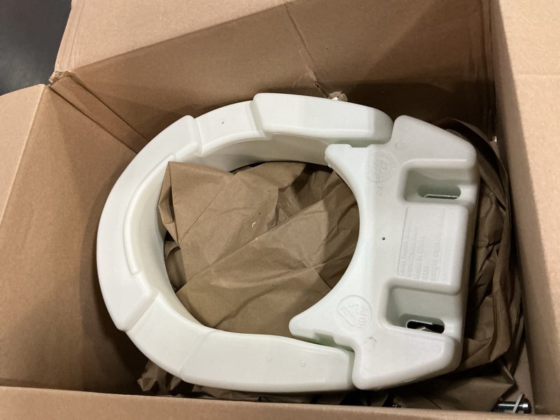 Condition photo showing As Is for carex elongated raised toliet seat,