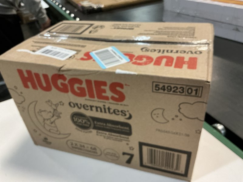 Condition photo showing New/Like New for Huggies Overnites Diapers Econ+ Pack - Size 7 - 68ct
