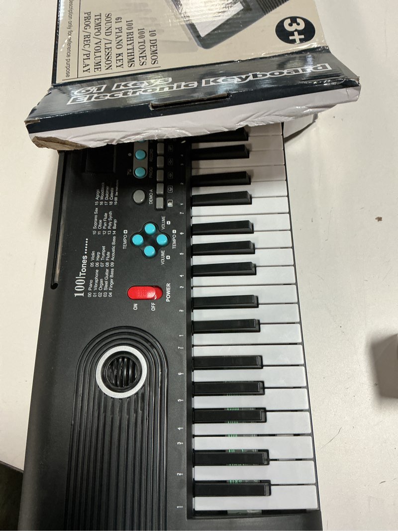 Condition photo showing Good Condition for 61 key keyboard Piano,Portable Electronic Digital Piano,Built In Dual Speakers,External Microphone,Power Plug,Rich Teaching Content,Multi-Functional Electronic Piano Suitable For Beginners kkek5 black