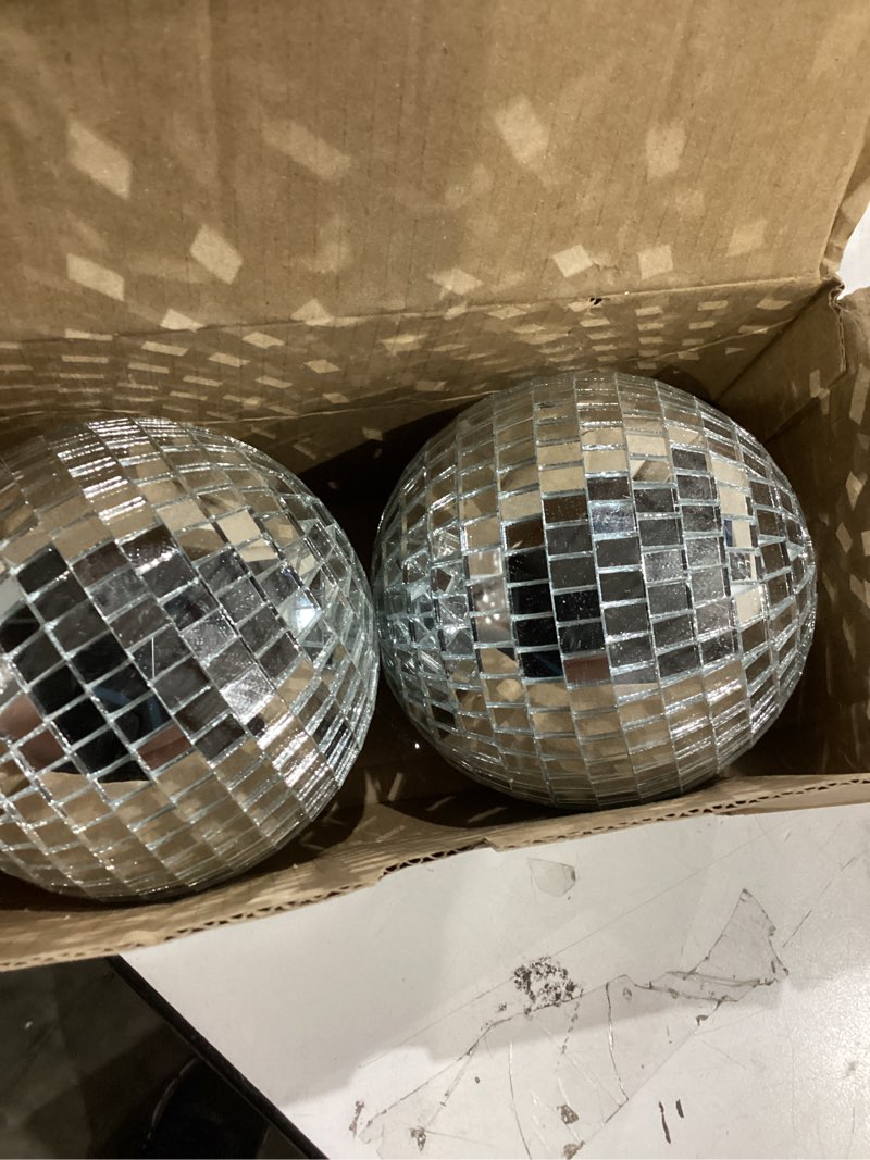 Condition photo showing New/Like New for youdepot disco ball 4 inch 2-pack, silver mirror balls with hanging strings | reflective mirror tiles create sparkling effects for weddings, birthdays, retro parties, stages, classrooms and home decor.