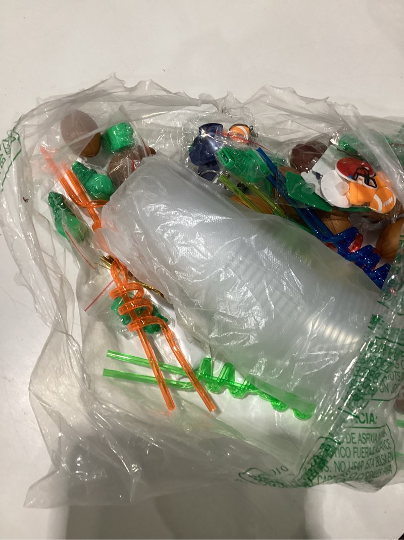 Condition photo showing As Is for liyiq 158 pcs football party favors football party supplies with cup straw stress ball keychain sticker slaps bracelets whistle thank you tags for football birthday decorations