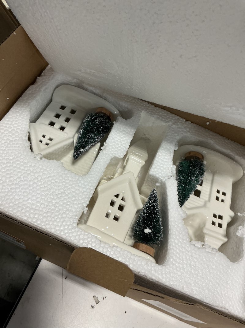 Condition photo showing Good Condition for DN DECONATION Light up Christmas Decor Ceramic Village Houses, 3Pcs White Christmas Porcelain Villages with Frosted Trees, Holiday House Figurines Xmas Village Sets for Winter Table Decoration Indoor Snow White 3PCS
