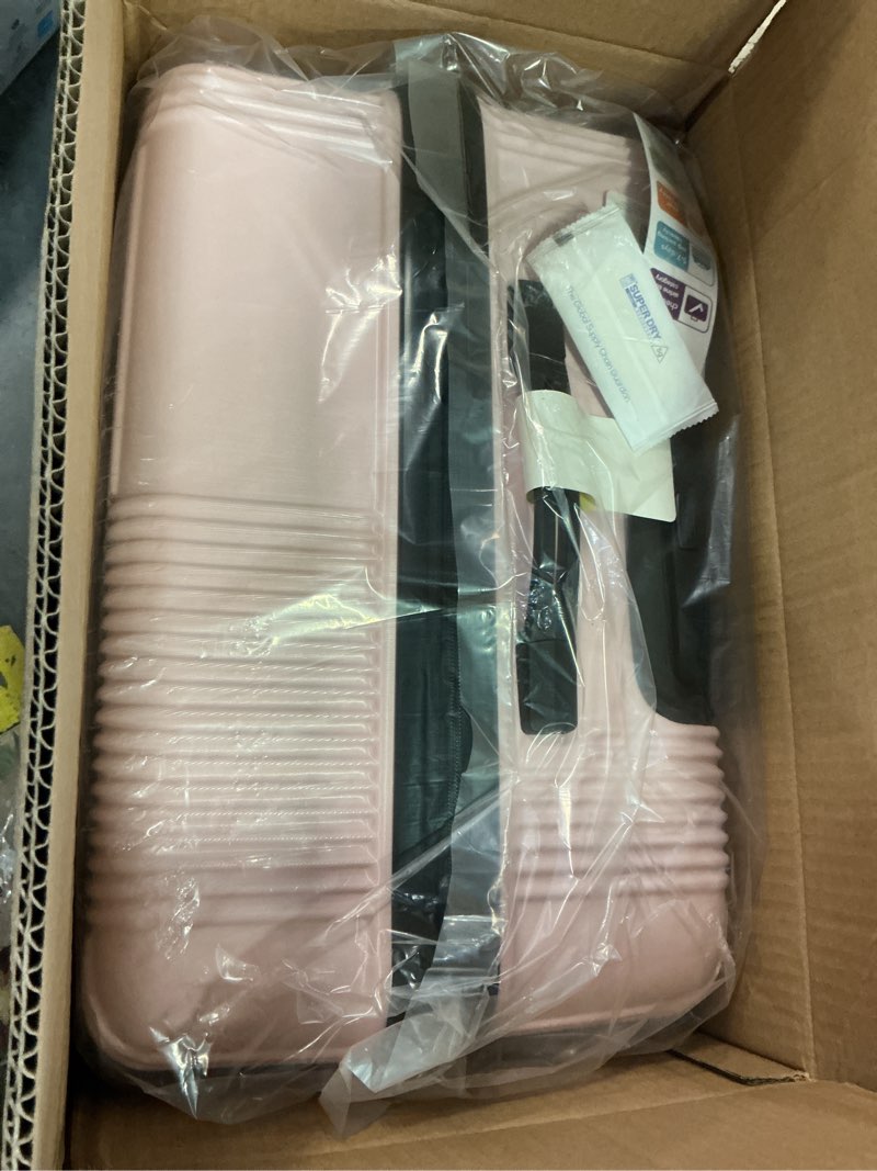Condition photo showing As Is for american tourister stratum xlt expandable hardside luggage with spinner wheels, pink blush, checked-medium 24-inch checked-medium 24-inch petal pink