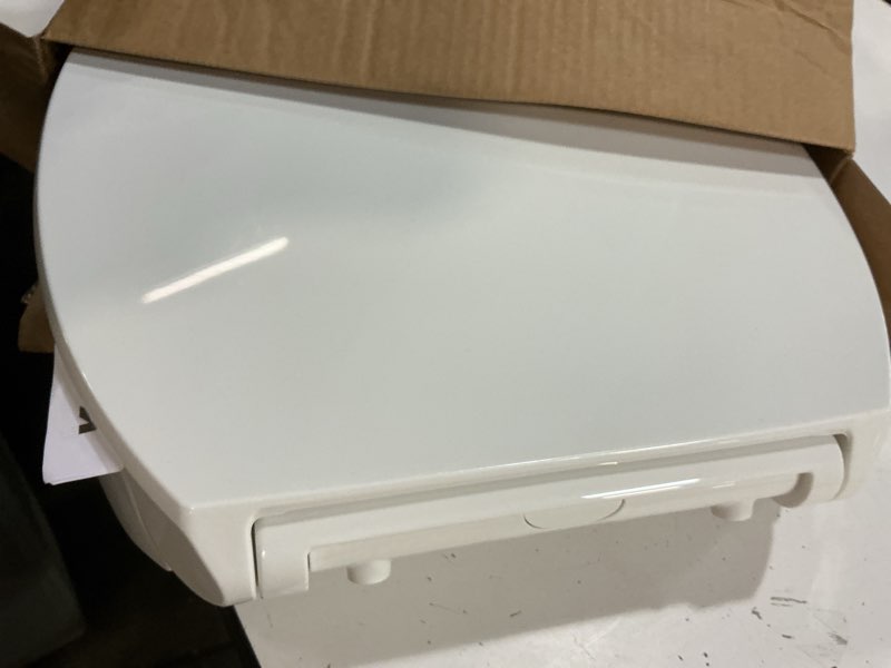 Condition photo showing As Is for kohler 25876-0 hyten 3" height, elevated soft close round toilet seat, contoured seat with grip-tight bumpers, quick-attach hardware, white white round