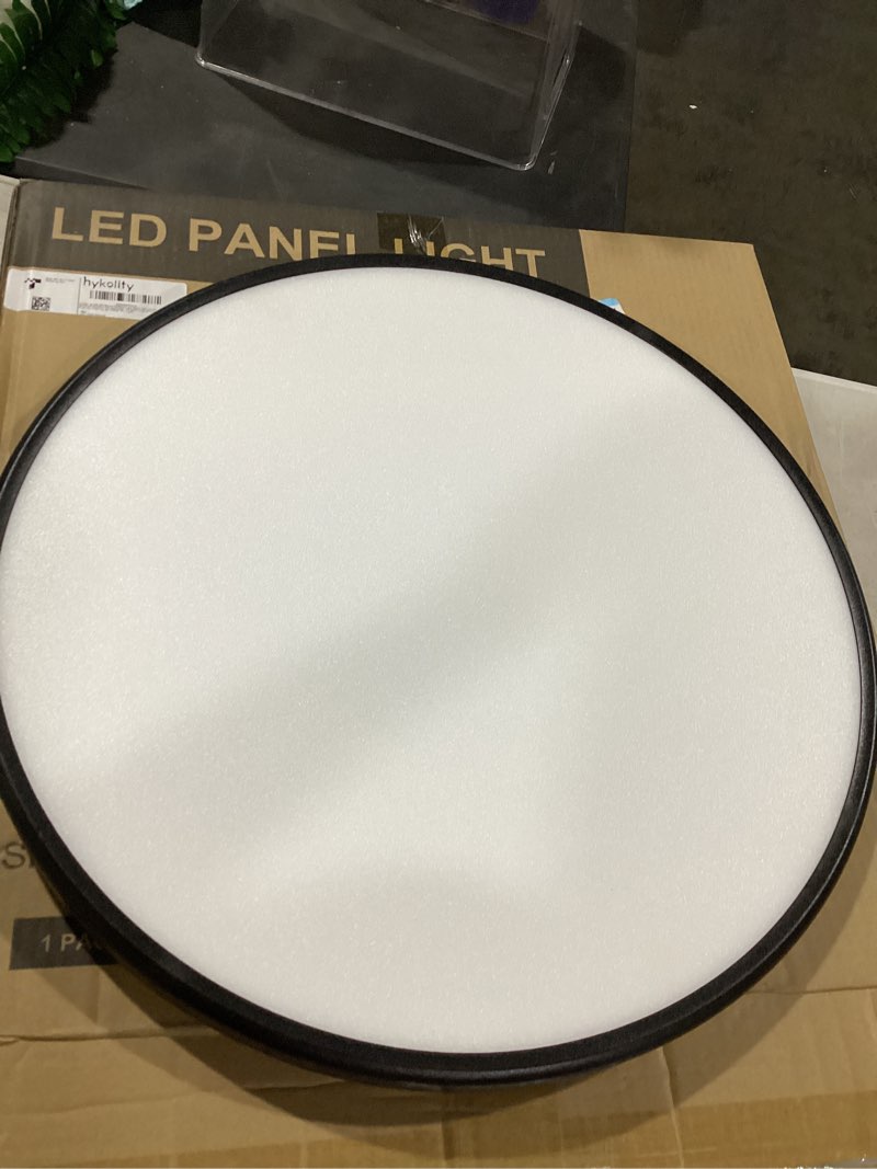 Condition photo showing As Is for hykolity 9 inch selectable cct led round flat panel light, 18w 1800lm 3000k/4000k/5000k, edge-lit flush mount ceiling light fixture for kitchen, bedroom, laundry and closet room, black 9 inch black