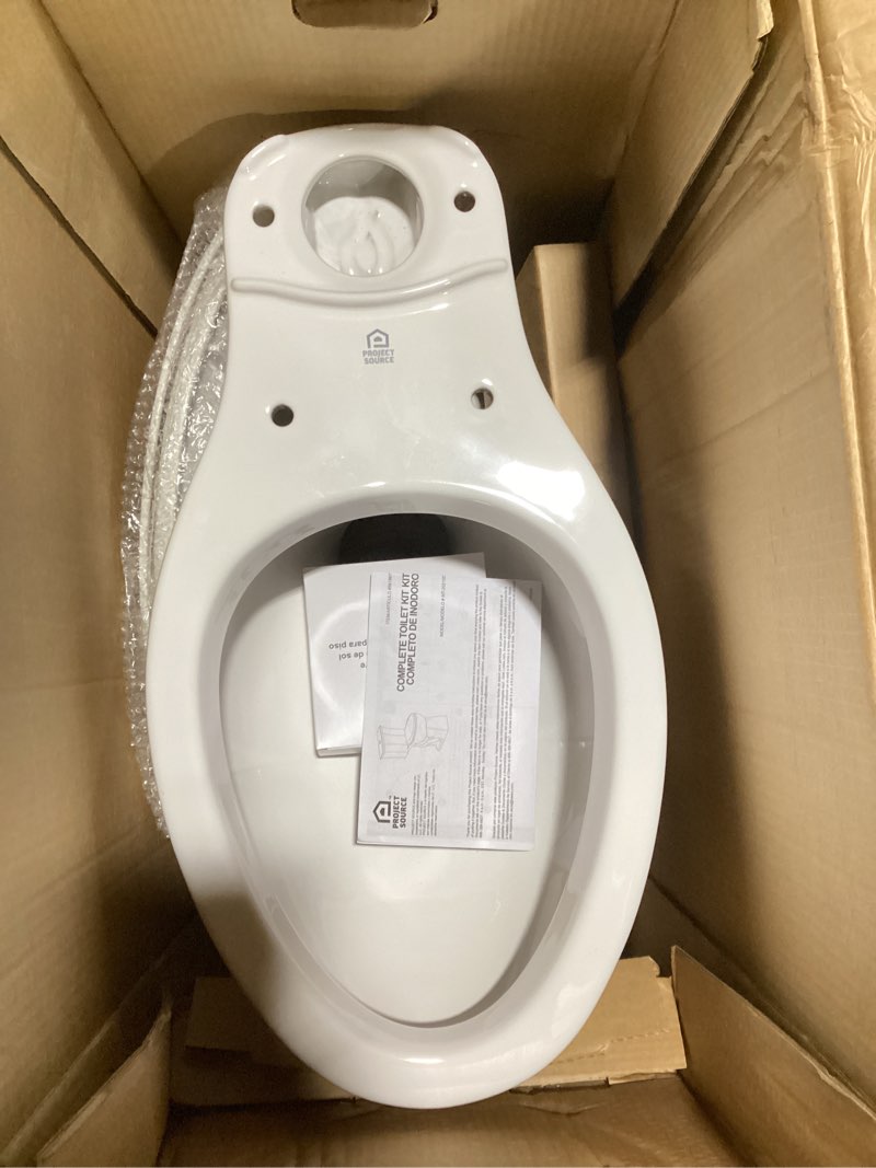 Condition photo showing As Is for project source palazzo white dual flush elongated chair height 2-piece soft close toilet 12-in rough-in watersense 1.6-gpf
