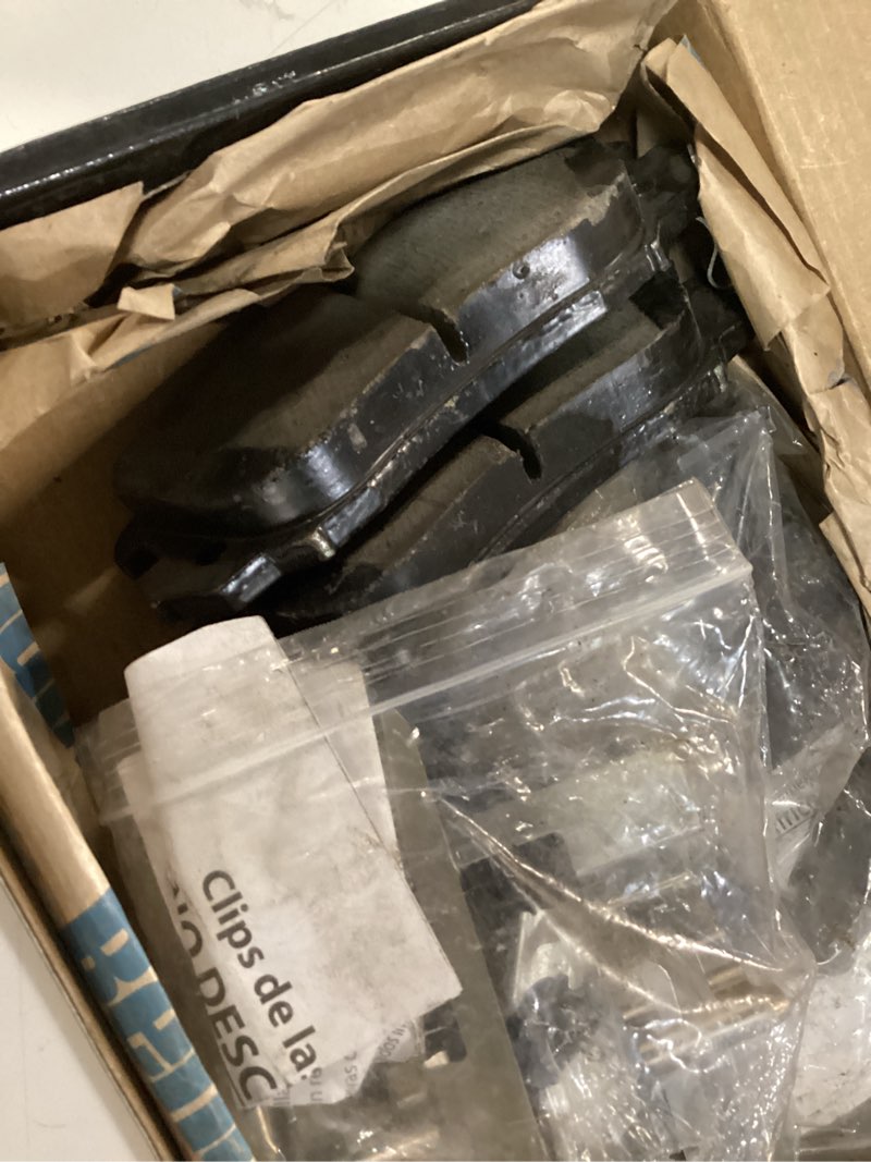Condition photo showing As Is for bendix premium sbc1363 ceramic front brake pads for select cadillac escalade, esv, ext, xts, chevrolet avalanche, cheyenne, express 1500, silverado, suburban, tahoe, gmc savana, sierra classic, yukon