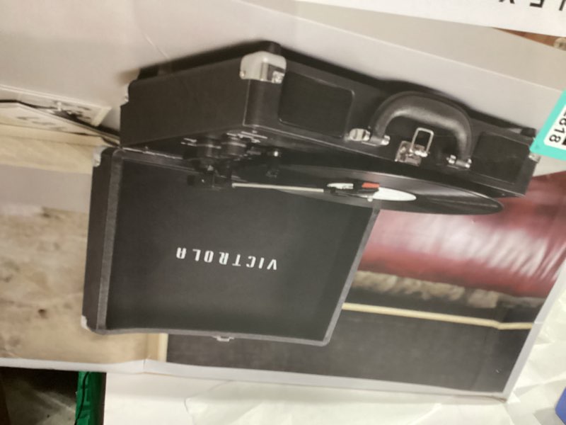 Condition photo showing As Is for Victrola Journey Bluetooth Portable Suitcase Record Player – with Built-in Speakers, 3 Speed Vinyl Record Player, RCA Out, Headphone Jack (Black)