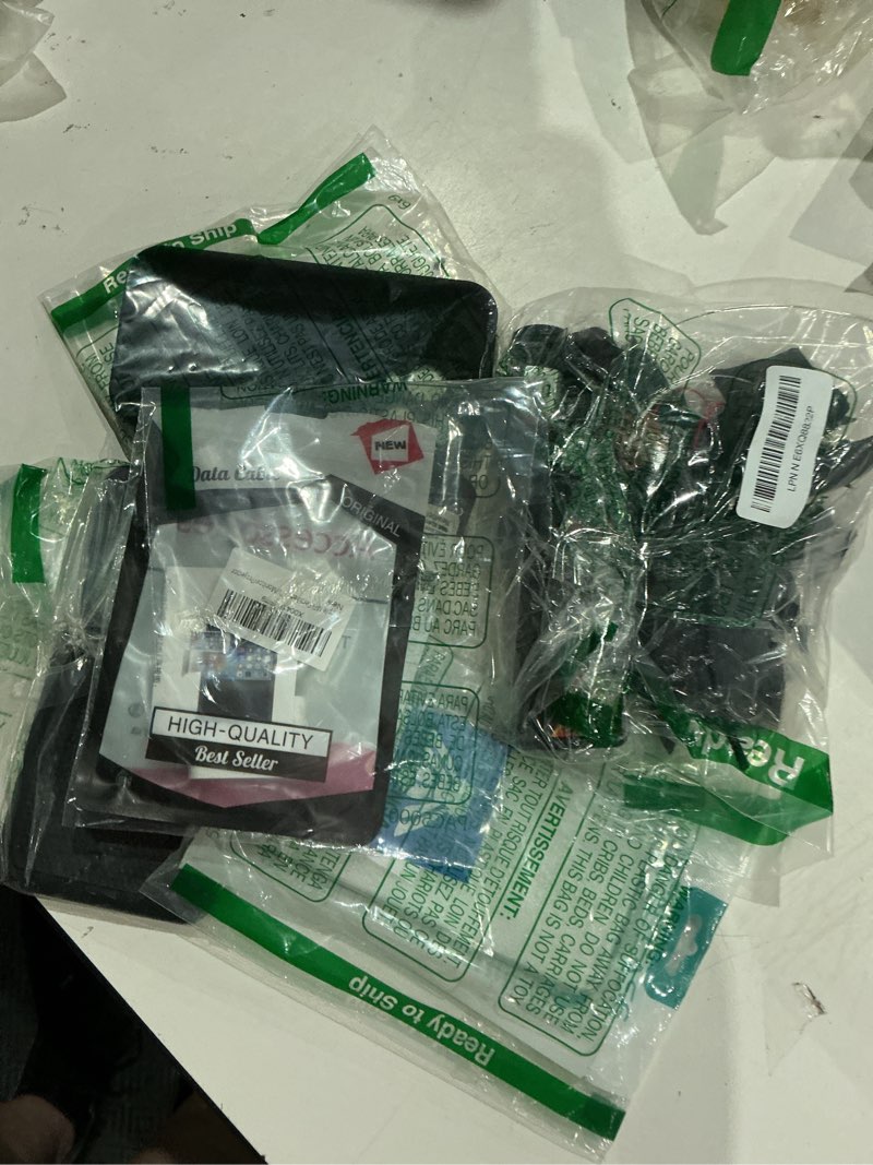 Condition photo showing As Is for assorted cellphone/tablet/laptop case covers & accessories
