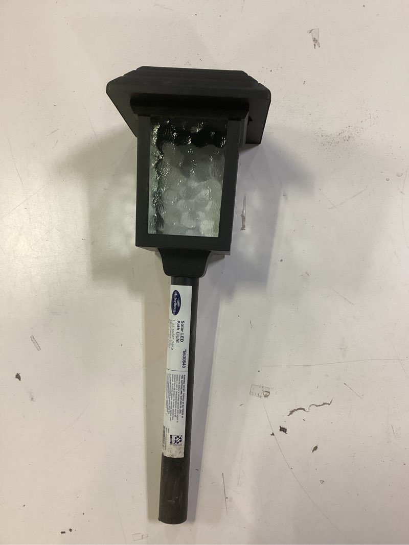 Condition photo showing As Is for harbor breeze solar led path light