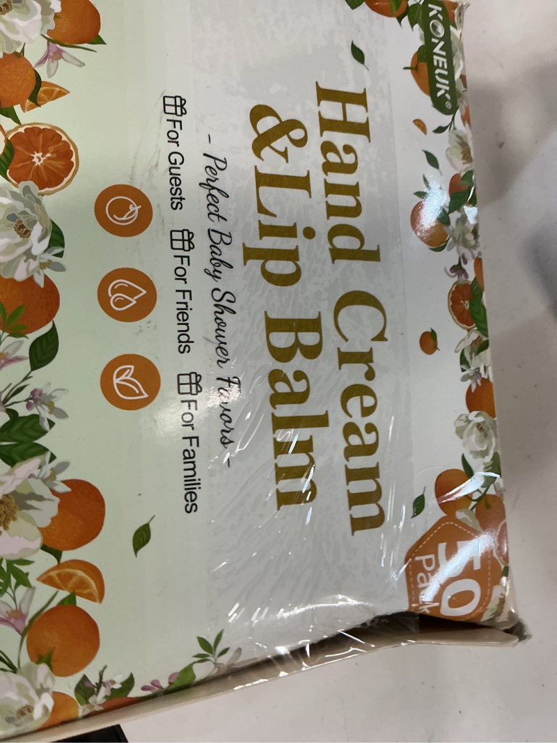 Condition photo showing New/Like New for 50 pack bulk hand cream and bulk lip balm gifts sets, bridal shower favors and baby shower favors for guests with thank you card and organza gift bags, appreciation gifts, baby shower prizes (orange) 50pack orange lip balm and hand cream sets