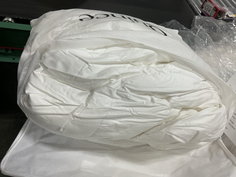 Condition photo showing As Is for quince premium down alternative comforter full/queen 