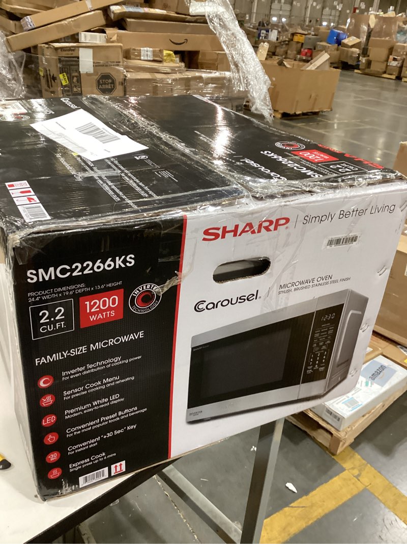 Condition photo showing As Is for sharp microwave 2.2 cu ft