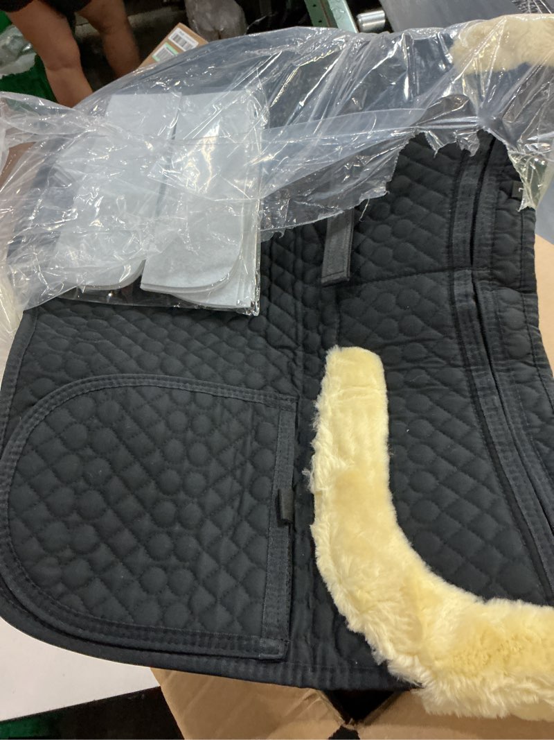 Condition photo showing New/Like New for universal english saddle pad with adjustable shims, faux shearling trim, plush faux wool, 3d cooling & non-slip tech. ideal for dressage, jumping & training. machine washable black