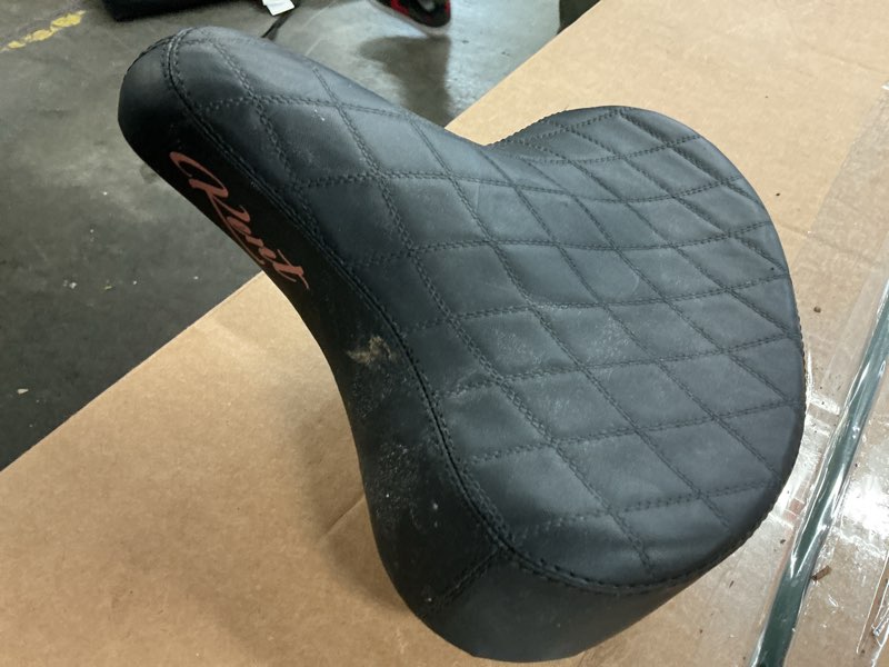 Condition photo showing As Is for kent beach comfort cruiser bicycle seat diamond pattern black & pale pink/purple