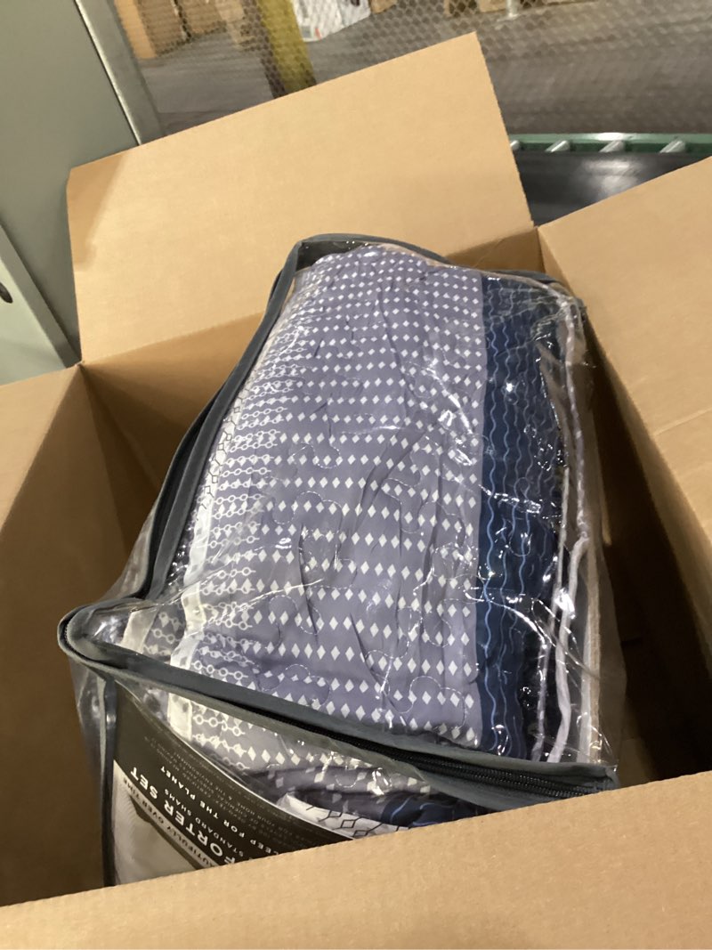 Condition photo showing As Is for USED SIMILAR TO Madison Park Marina Comforter Quilt Combo Set - Modern Luxury Design, All Season Down Alternative Bedding, Matching Shams, Decorative Pillows, Full/Queen(90\\\"x90\\\"), Seersucker Blue 8 Piece Full/Queen Marina Coastal Stripes Blue