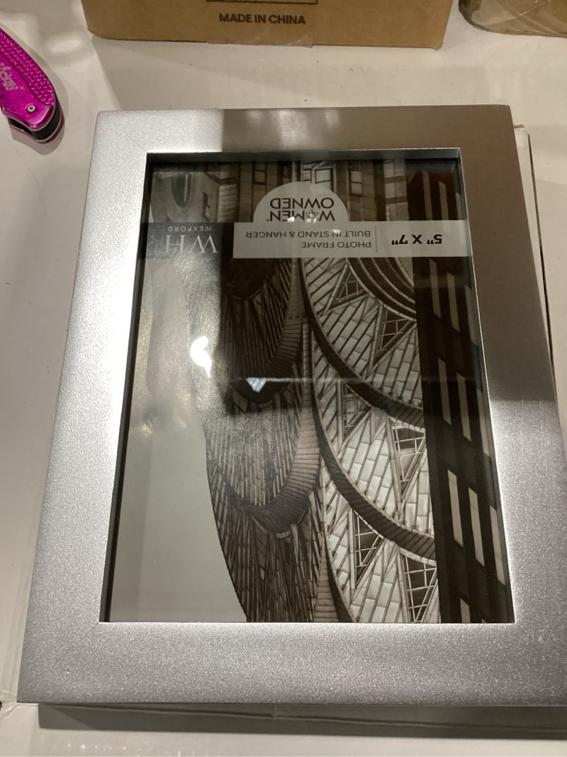 Condition photo showing Good Condition for renditions 5x7 inch solid wood picture frame, high definition glass and high-end modern style ready for wall and tabletop photo display, silver frame