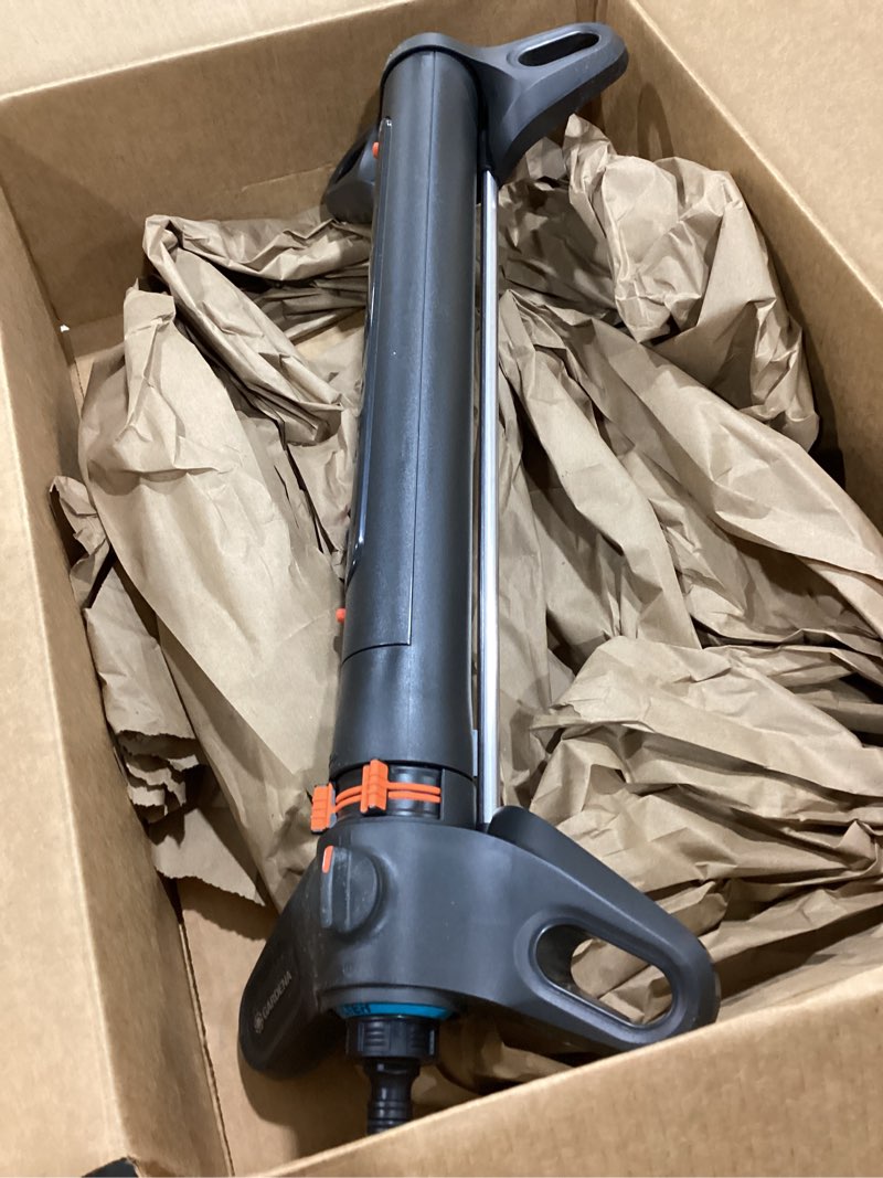 Condition photo showing As Is for gardena 20570 | up to 3800 sq ft - aquazoom adjustable oscillating yard sprinkler, for watering large area lawn and garden. aquazoom outdoor oscillating sprinkler has wide heavy duty base. 3800² ft sprinkler