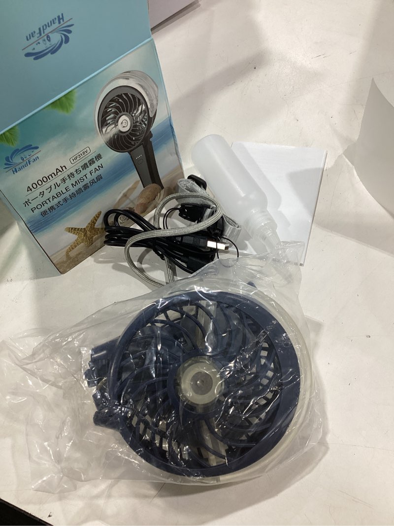 Condition photo showing New/Like New for handfan 4000mah portable misting fan, 50ml water tank, rechargeable handheld personal mister fan, spray water mist, foldable electric cooling ice fans for beach, travel, outdoors(black) 4000mah black