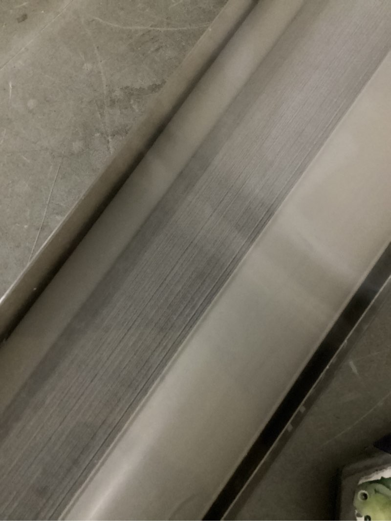 Condition photo showing As Is for allen + roth 34-in x 72-in gray light filtering cordless cellular shade