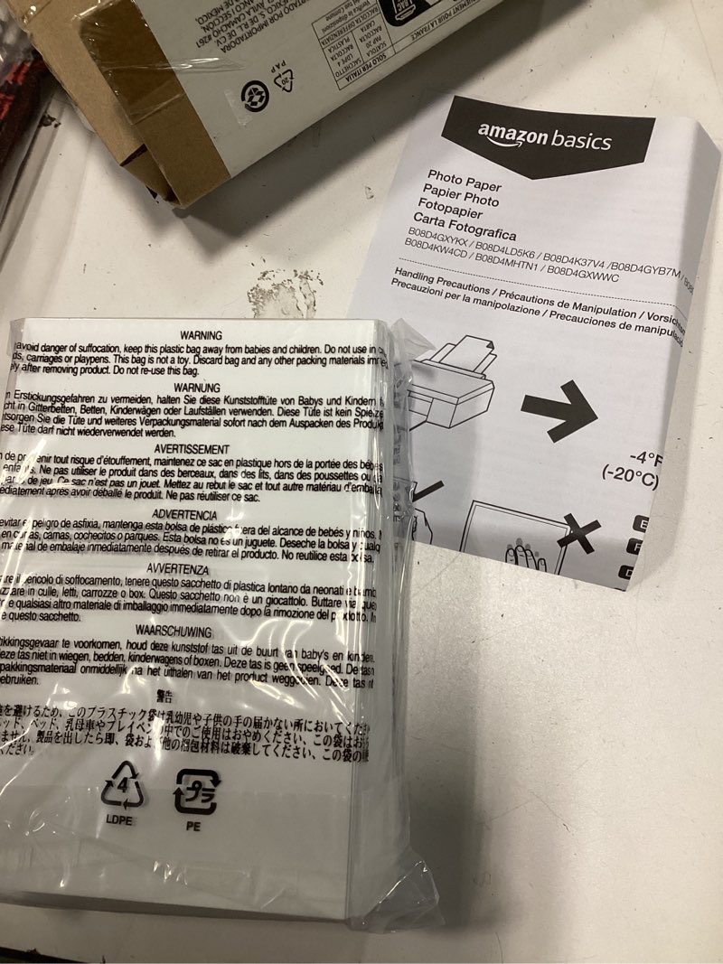 Condition photo showing New/Like New for Amazon Basics 4 x 6 inch Semi-Glossy Photo Paper for Inkjet Prints, 300g/m², White, 100 Sheet Pack