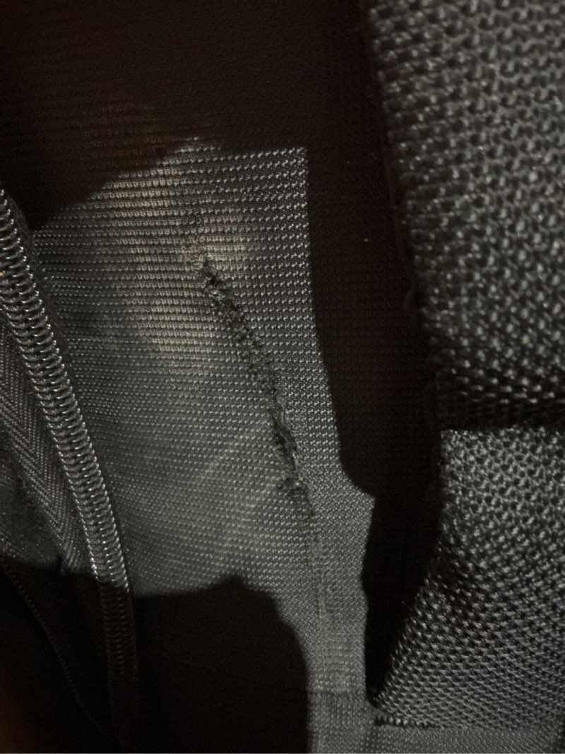 Condition photo showing As Is for (Ripped)American Tourister 4 KIX 2.0 Expandable Softside Luggage with Spinner Wheels, 20 SPINNER, BLACK 20 SPINNER Black
