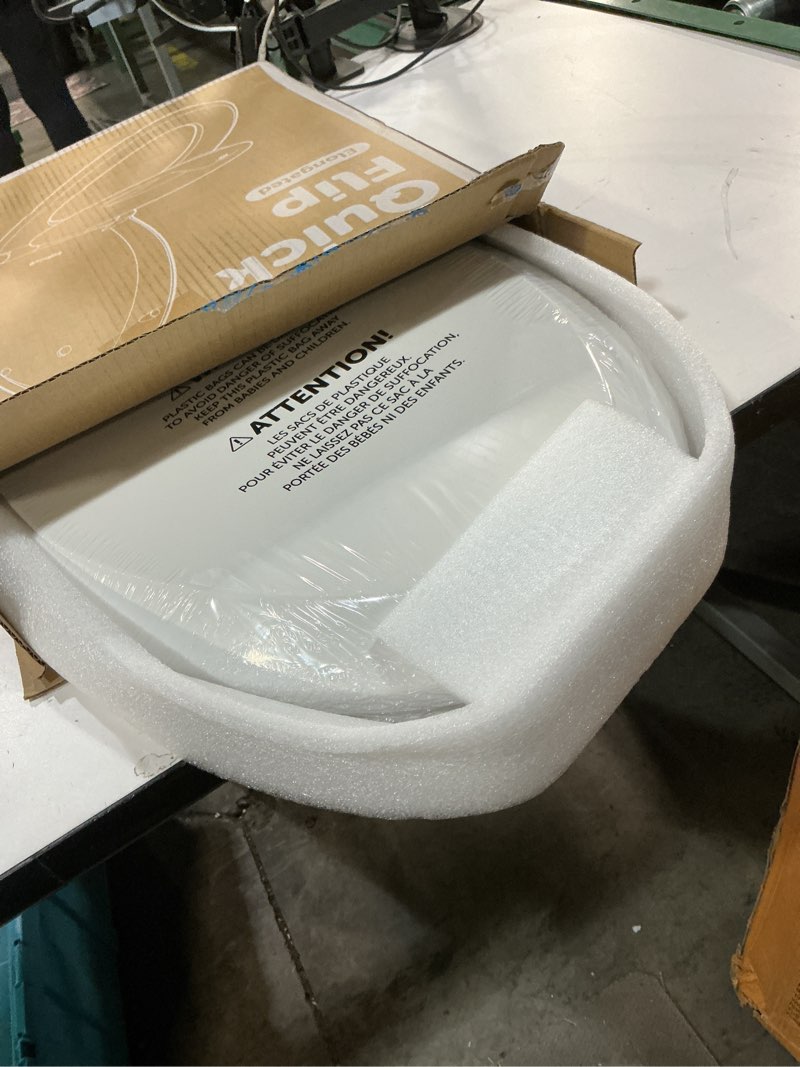 Condition photo showing New/Like New for jool baby quick flip toilet seat with built-in potty & splash guard for toddler training, slow close (elongated) oblong