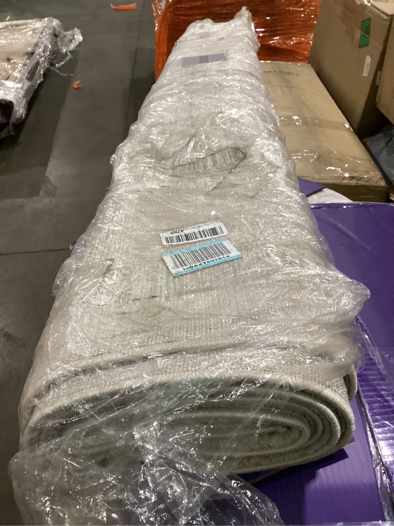 Condition photo showing As Is for Loloi Amber Lewis Monty Collection MOT-01 Ivory/Taupe 6'-7" x 9'-3", .50" Pile Height, Area Rug