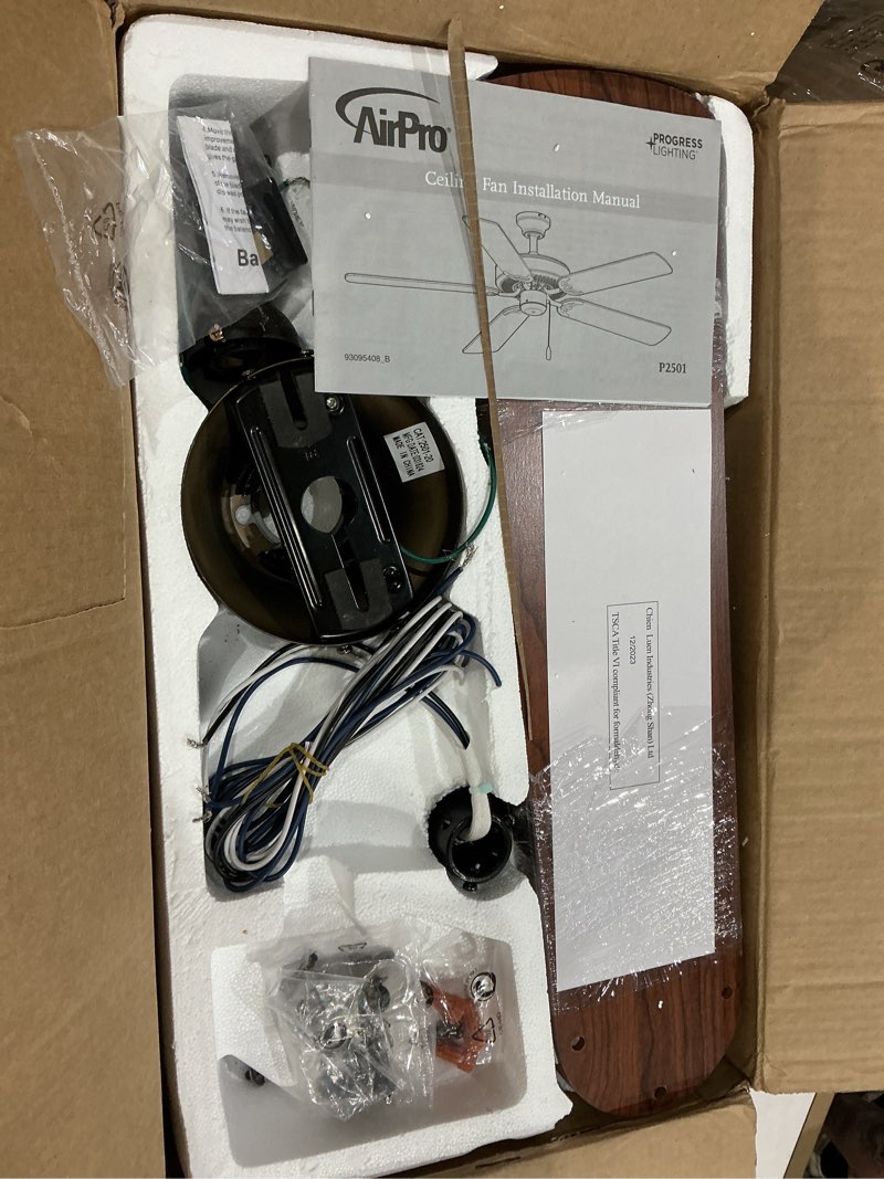 Condition photo showing As Is for progress lighting p2501-20 52-inch fan with 5 blades and 3-speed reversible motor with reversible medium cherry or classic walnut blades, antique bronze