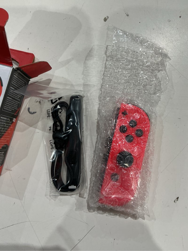 Condition photo showing Good Condition for nintendo joy-con (r) - neon red switch neon red joy-con (r)