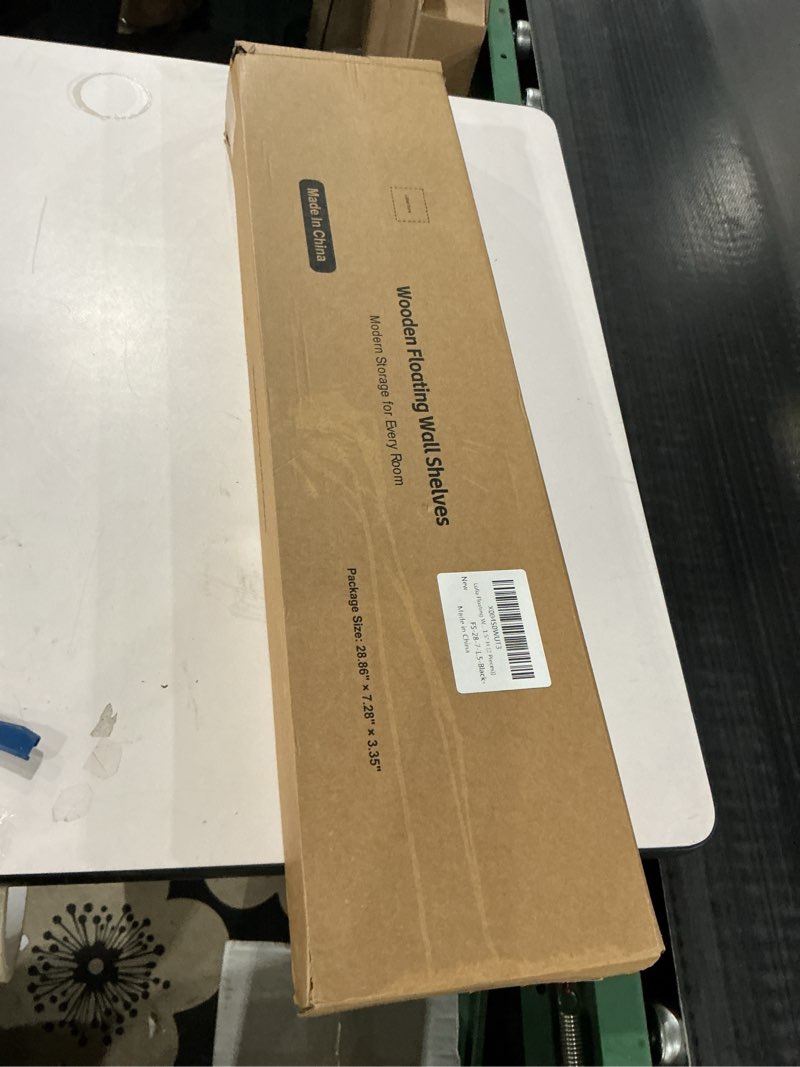 Condition photo showing New/Like New for Lufia Floating Wall Shelves, Set of 2, MDF with Invisible Brackets, Modern Storage for Bedroom, Bathroom, Living Room, Kitchen (Black, 28" W X 7" D X 1.5" H) Black 28" W x 7" D x 1.5" H (2 pieces)?