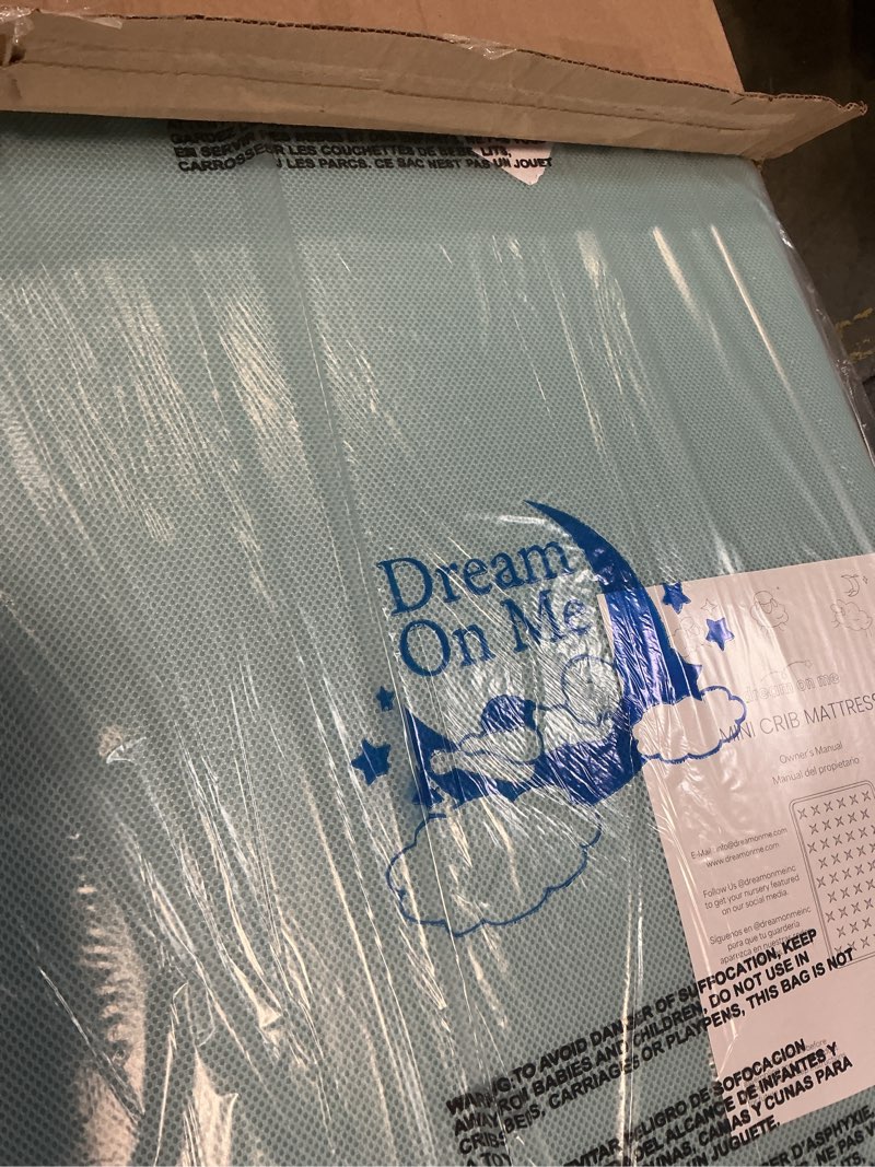 Condition photo showing New/Like New for dream on me snuggles extra firm dual-sided baby crib mattress with breathable fabric, water & odor resistant, greenguard gold certified, fits mini & portable cribs (38”x 24”x 3”) - blue mist