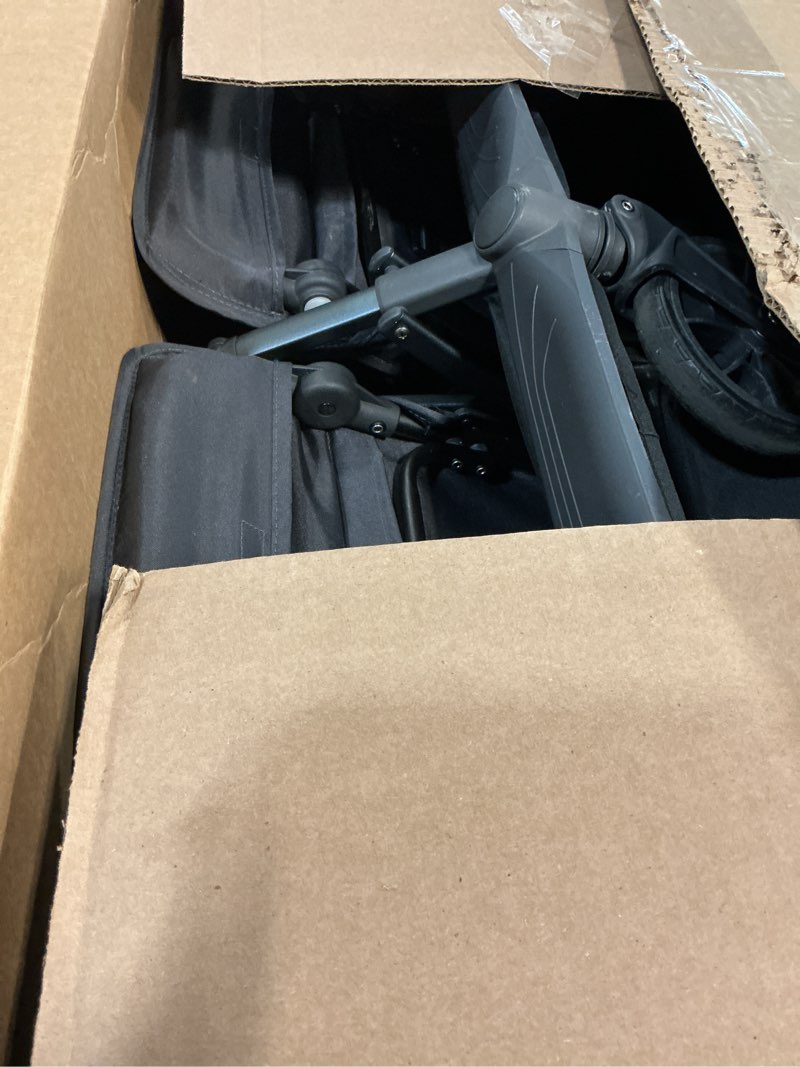 Condition photo showing As Is for joovy kooper x2 side-by-side double stroller featuring dual snack trays, one-handed fold, multi-position reclining seats, adjustable leg rests, and 2 zippered pockets for storage, forged iron kooper x2 double forged iron