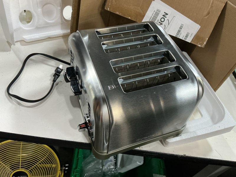 Condition photo showing As Is for cuisinart 4 slice compact stainless steel toaster with extra-wide slots for bread, french toast, bagels & pastries, defrost & reheat functions, cpt-180p1, brushed stainless, removable crumb tray