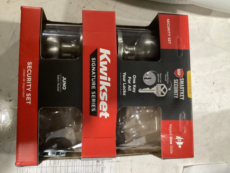 Condition photo showing As Is for kwikset signature series juno satin nickel exterior single-cylinder deadbolt and keyed entry door