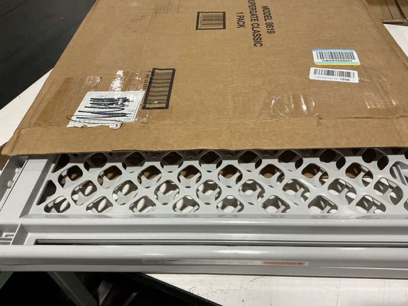 Condition photo showing New/Like New for mypet universal pet gate: 26” - 42” wide dog gate for doorways with pressure fit or swinging door hardware mounting types included: 26" tall; gray